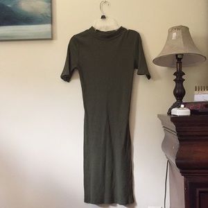 This is a long olive green dress with sleeves
